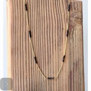 Elegant Gold and Black Beaded Necklace